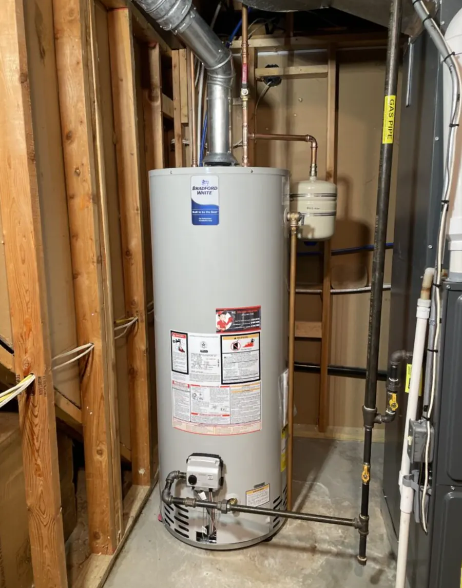 Gas tank water heater with expansion tank in an unfinished basement &mdash; Foothills Water Heaters